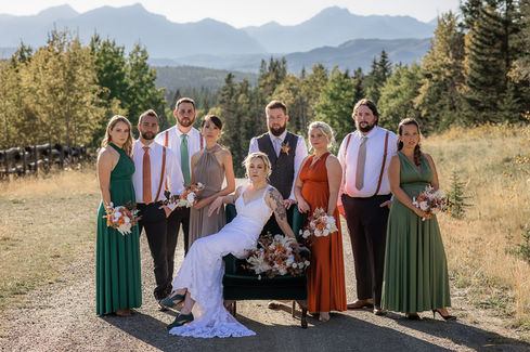 wedding party photo with green chair