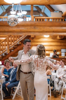 Wedding first dance inside Snowbird Chalet in Bragg Creek