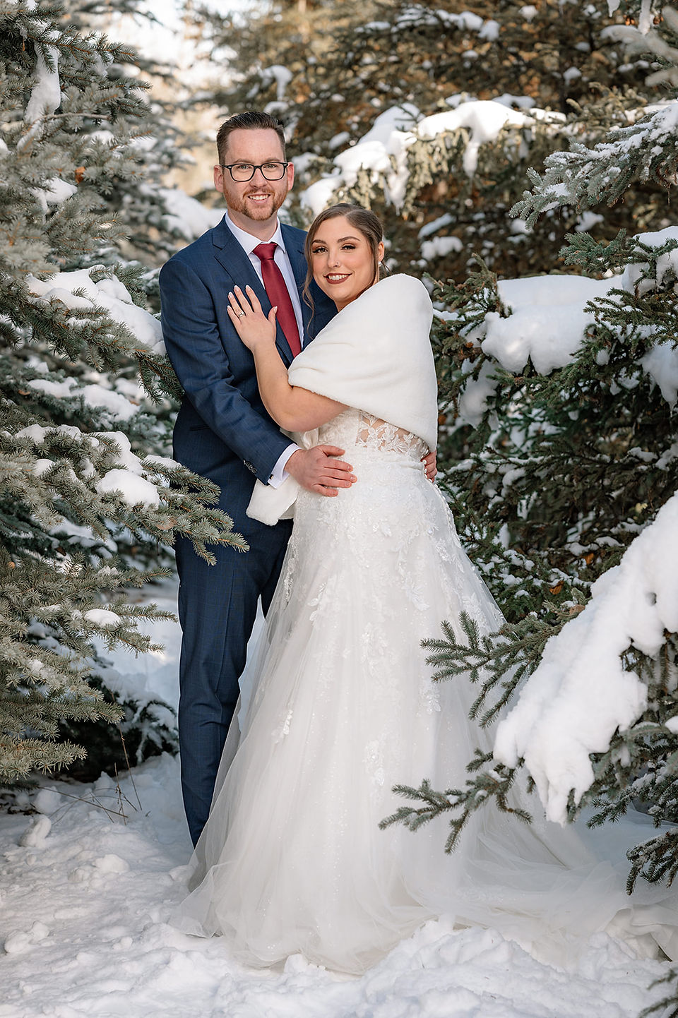 winter wedding photos with bride and groom