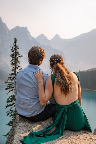 couple look out over smokey moraine lake 