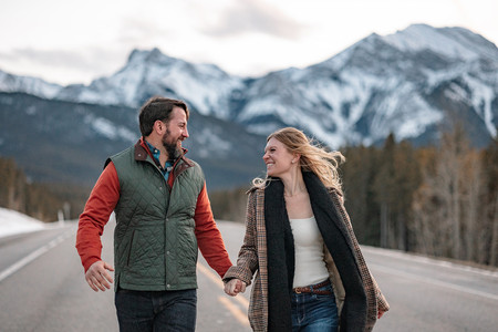 man and woman having a Rocky Mountains engagement shoot