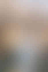 groom portrait at Moraine lake, standing in front of the rocky mountain peaks