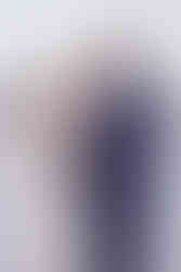 Bride smiling as she sees her soon to be husband for first time