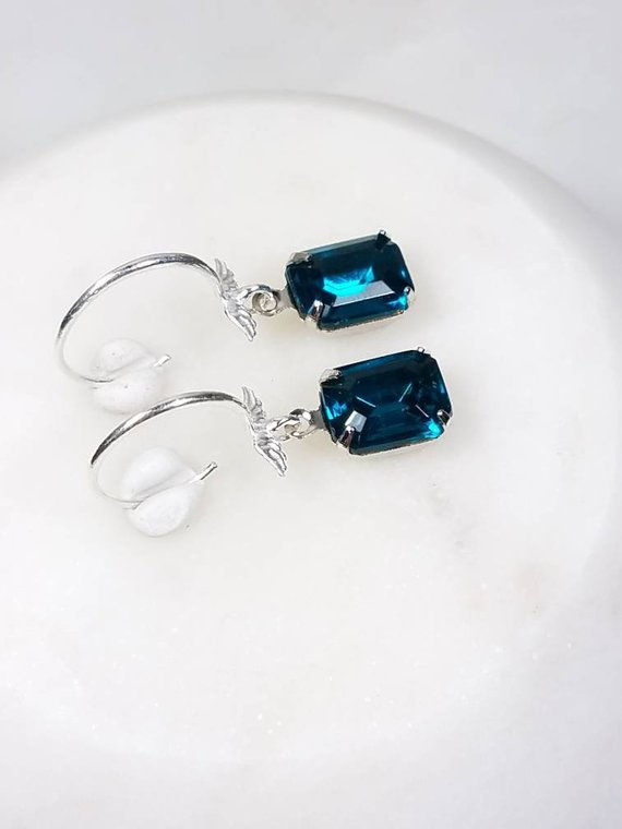 Thumbnail: Studiodragonfly19 Cremation Silver Wing Vintage Blue Glass Stone Earrings
