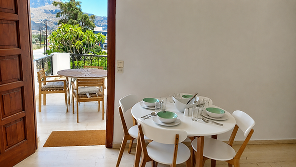 studio no3 kitchen table plus entrnce balcony.png