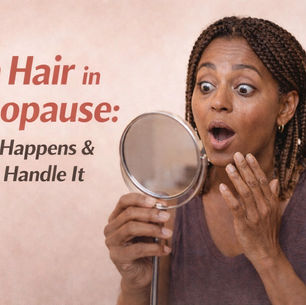 Woman looking surprised in a mirror at her chin hair. She is experiencing perimenopause.