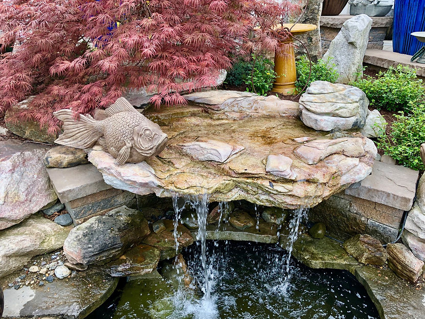 a-beautiful-landscaped-water-feature-provides-a-t-2021-08-30-09-24-05-utc.jpg