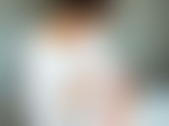 a mother feeding a baby