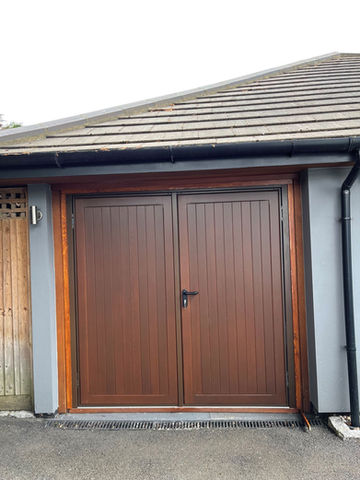 Brown hinged garage door