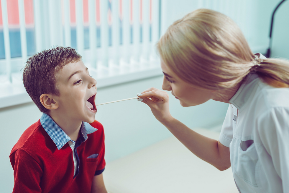 child having throat swabbed to test for strep throat