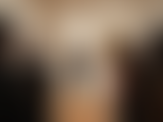 Museum guide guiding visitors through an art exhibit in NYC