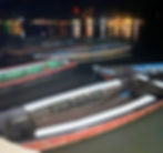 The image shows the small size of the ferry to the touristic village of Caraiva. The "ferry" is actually a row boat with a seating capacity of roughly 8 adults. 