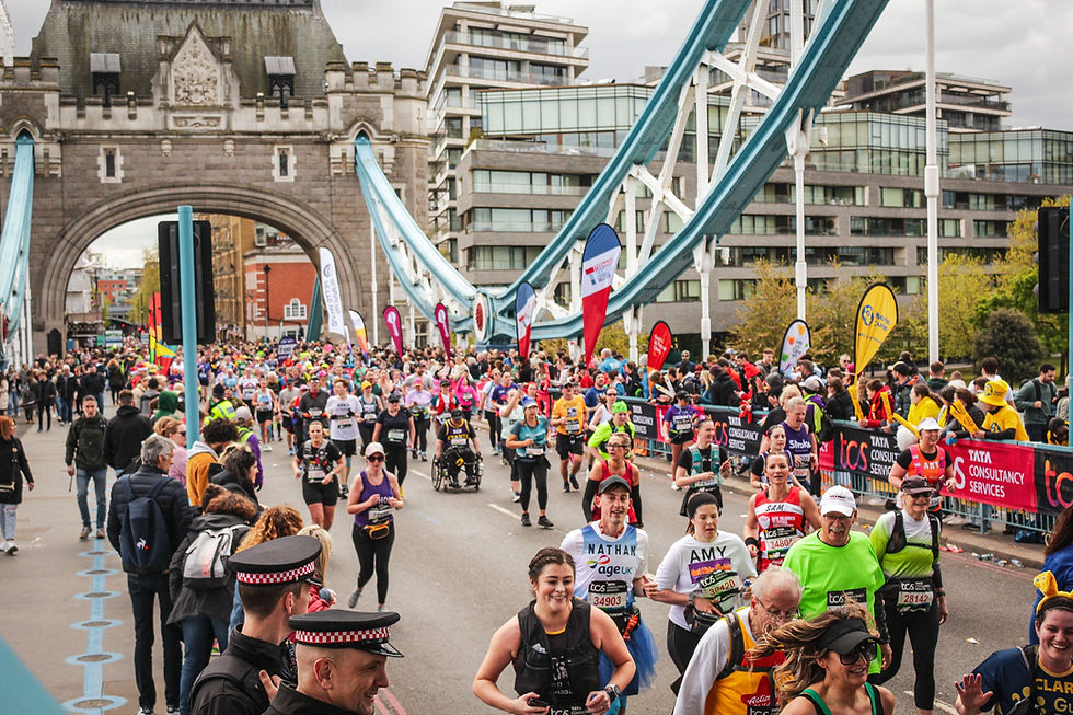 London Marathon participants running over Tower Bridge