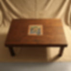 Wooden coffee table with decorative mosaics and tiles