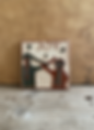 Handcrafted square tile with Joy text and figures.