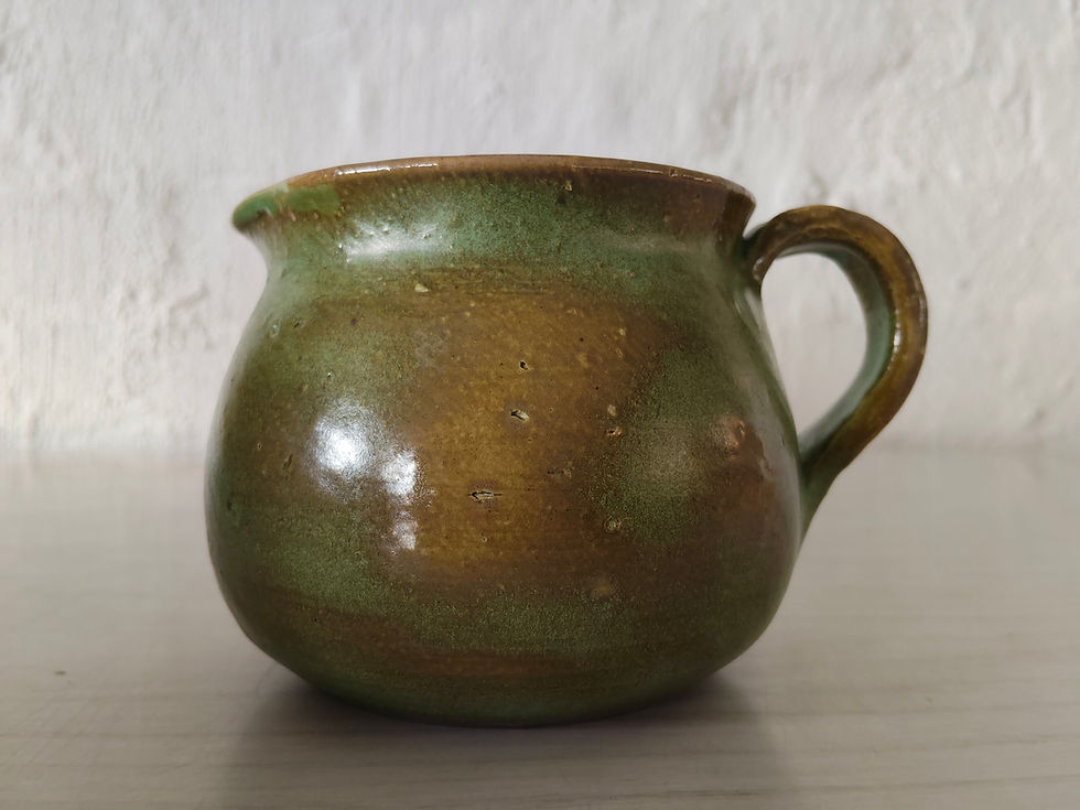 Thumbnail: Pottery Jug with Green Tones