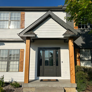 exterior home remodel new door cedar posts and paint 