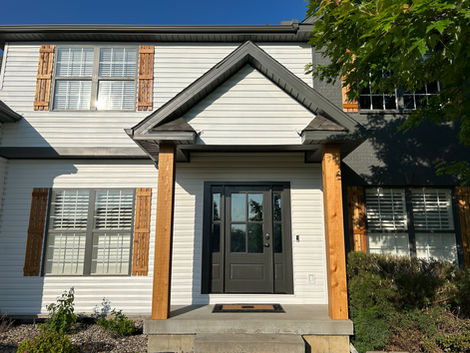 exterior home remodel new door cedar posts and paint 