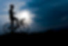 Silhouette of the cyclist riding a road bike at sunsetMountain bicycle and manLife style o