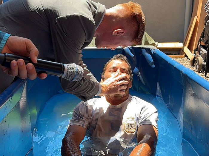 A new believer being baptized