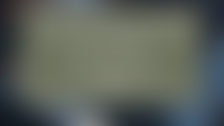 A workspace scene featuring a laptop, notebook, pen, and a takeaway coffee cup on a dark desk. At the center, a green box displays the text: “The Ten Executive Functions. Below the box is a small circular logo reading “Coaching Executive Function.” The image conveys productivity, focus, and organization.