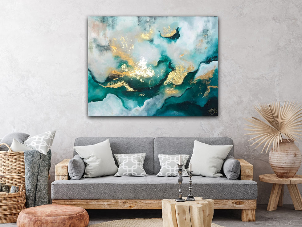 Abstract painting with teal, gold, and white tones hanging above a modern sofa in a minimalist living room