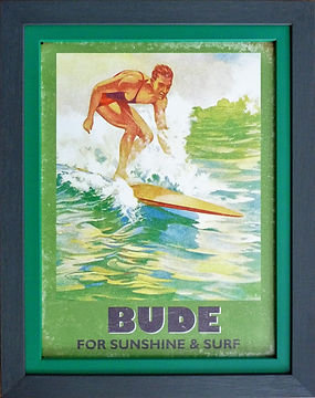 Bude tourist tin sign in a double picture frame.