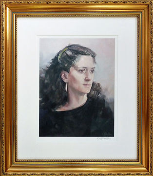 Portrait picture framing. A classic ornate gold frame and off white double mount.