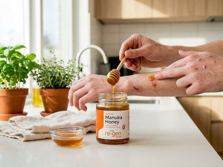 Hand applying Manuka honey on healing cut