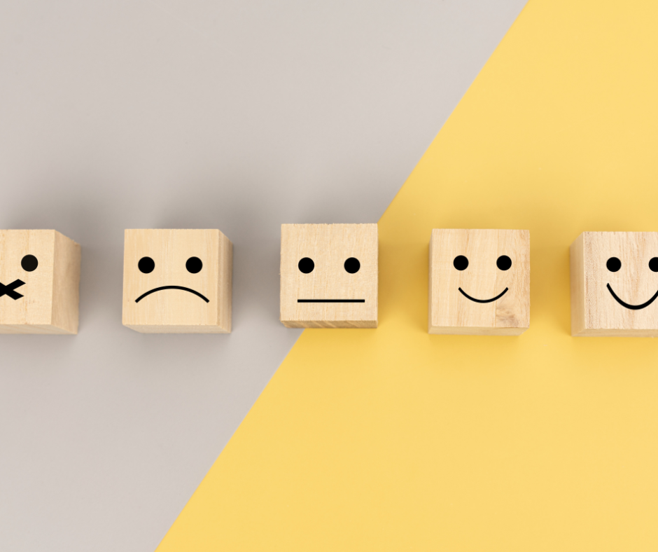A series of five blocks representing a survey scale of agreement with smiles/frowns.