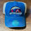 Thumbnail: Blue trucker hat embroidered with the Alaska Chip Company logo