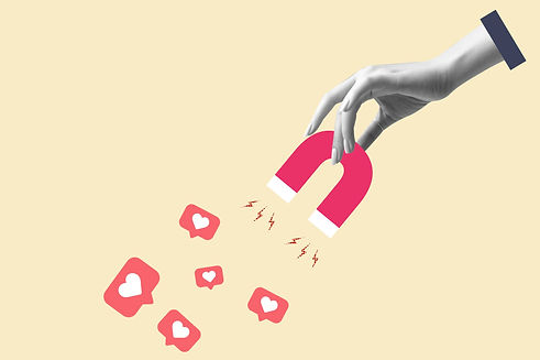 businessman hand holding magnet and magnetizing likes symbol. Concept of social media, inf