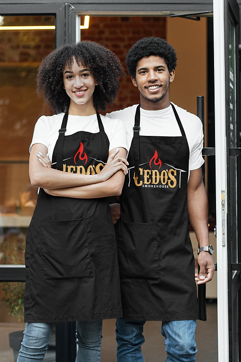 apron-mockup-featuring-two-waiters-posing-outside-a-restaurant-m2866-r-el2 (1).png