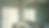 Close-up view of a large bathroom mirror reflecting natural light