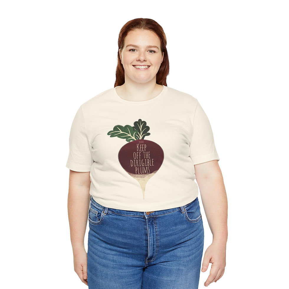 Thumbnail: Woman smiling, wearing cream t-shirt with beet graphic and text: "Please Keep Off The Dirigible Plums"