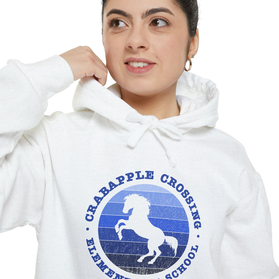 Woman in white Crabapple Crossing hoodie