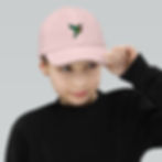 Youth wearing pink embroidered hummingbird baseball cap