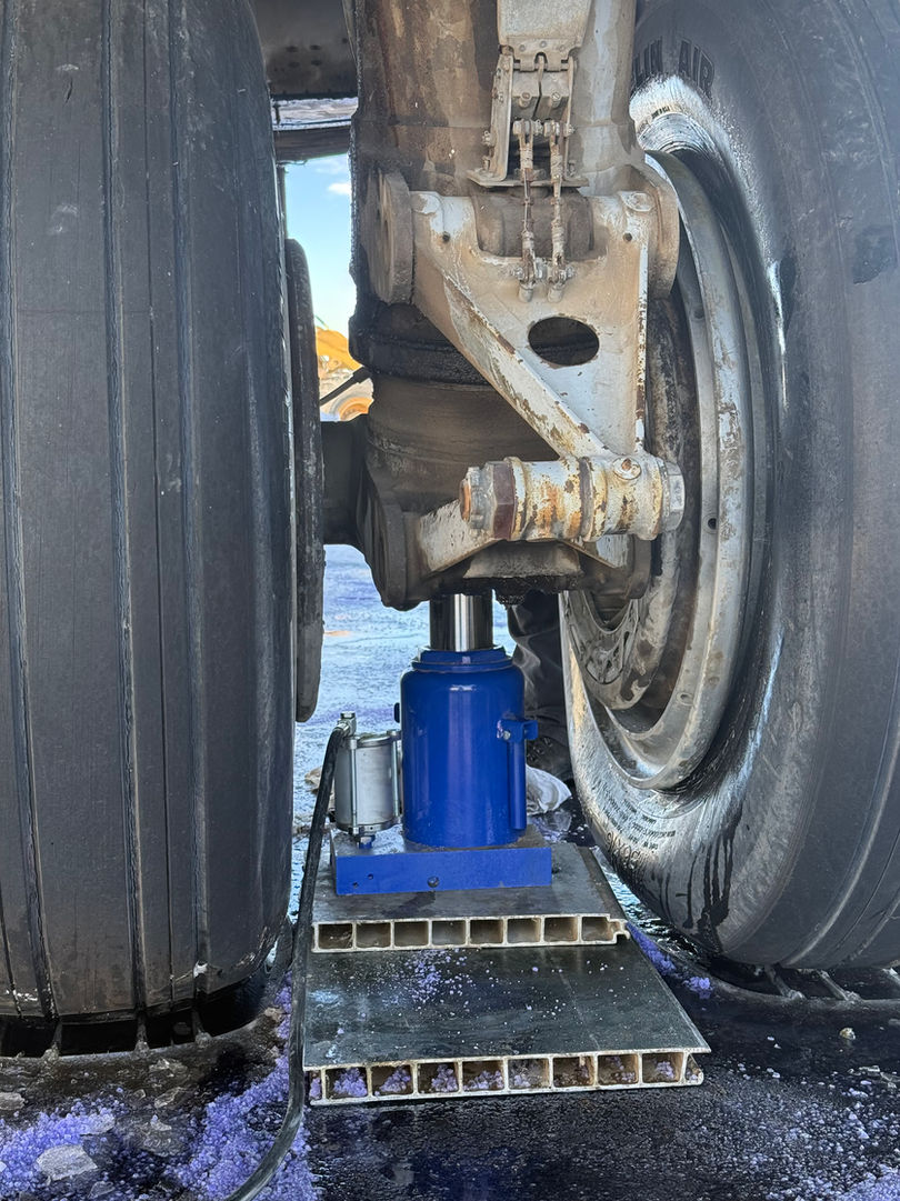 Photo of the tires being jacked before being inflated to make the move to the museum.