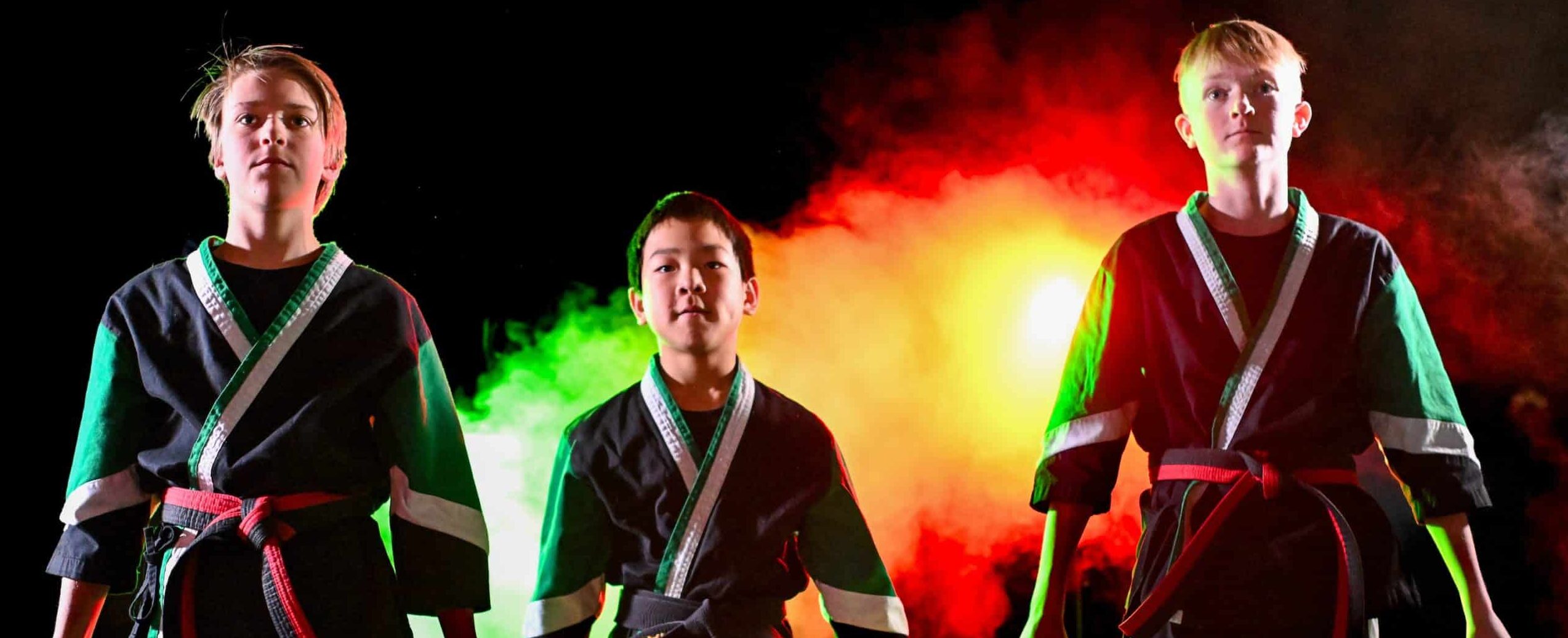 Three becks students stand at attention ready to begin their form