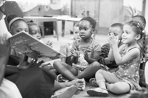 teacher-reading-a-book_edited.jpg