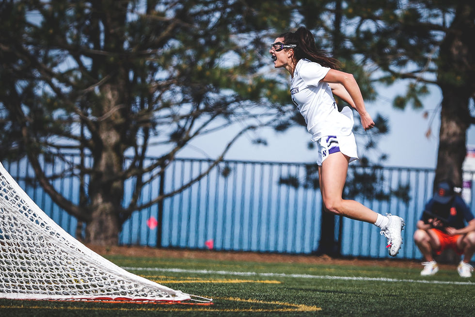 Lauren Gilbert of Northwestern celebrates her third goal of the game against Syracuse University