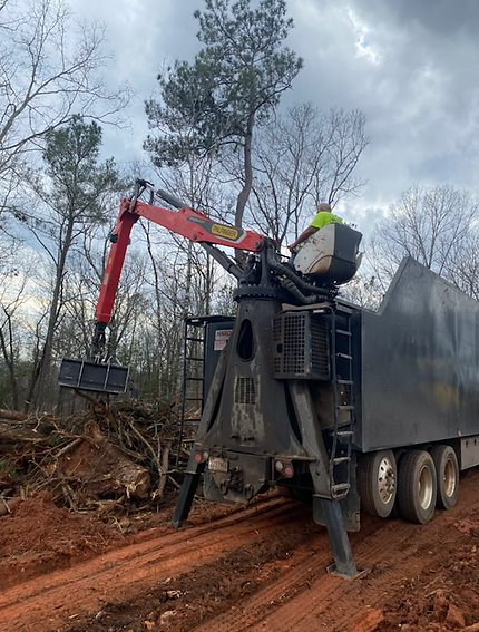 person operating grapple truck