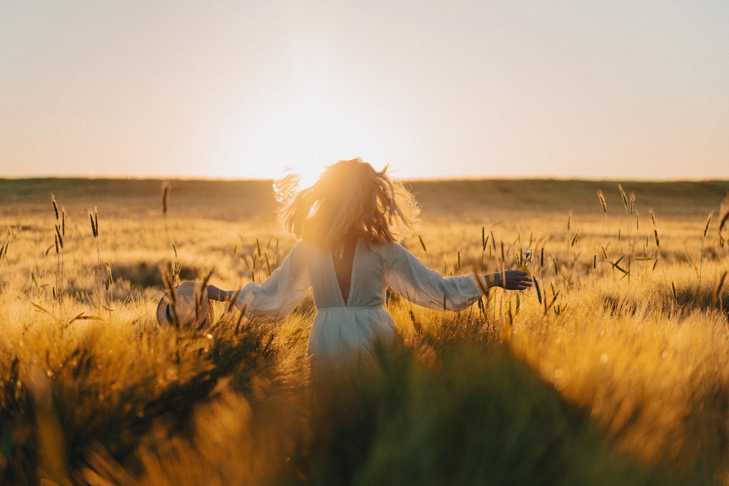 young-beautiful-woman-with-long-blond-hair-white-dress-wheat-field-early-morning-sunrise-s