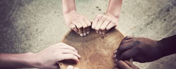 Hands Holding Wooden Plate