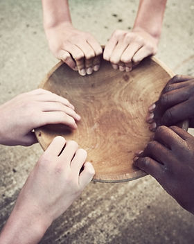 Hands Holding Wooden Plate