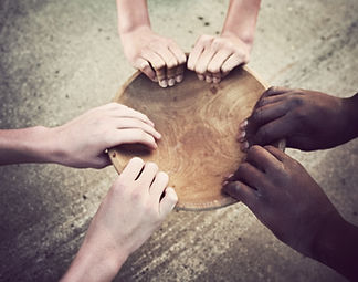 Hands Holding Wooden Plate