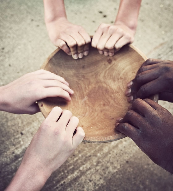 Hands Holding Wooden Plate