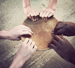 Hands Holding Wooden Plate