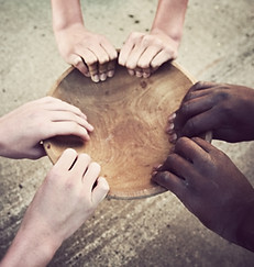 Hands Holding Wooden Plate