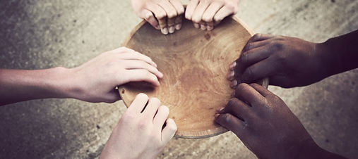 Hands Holding Wooden Plate